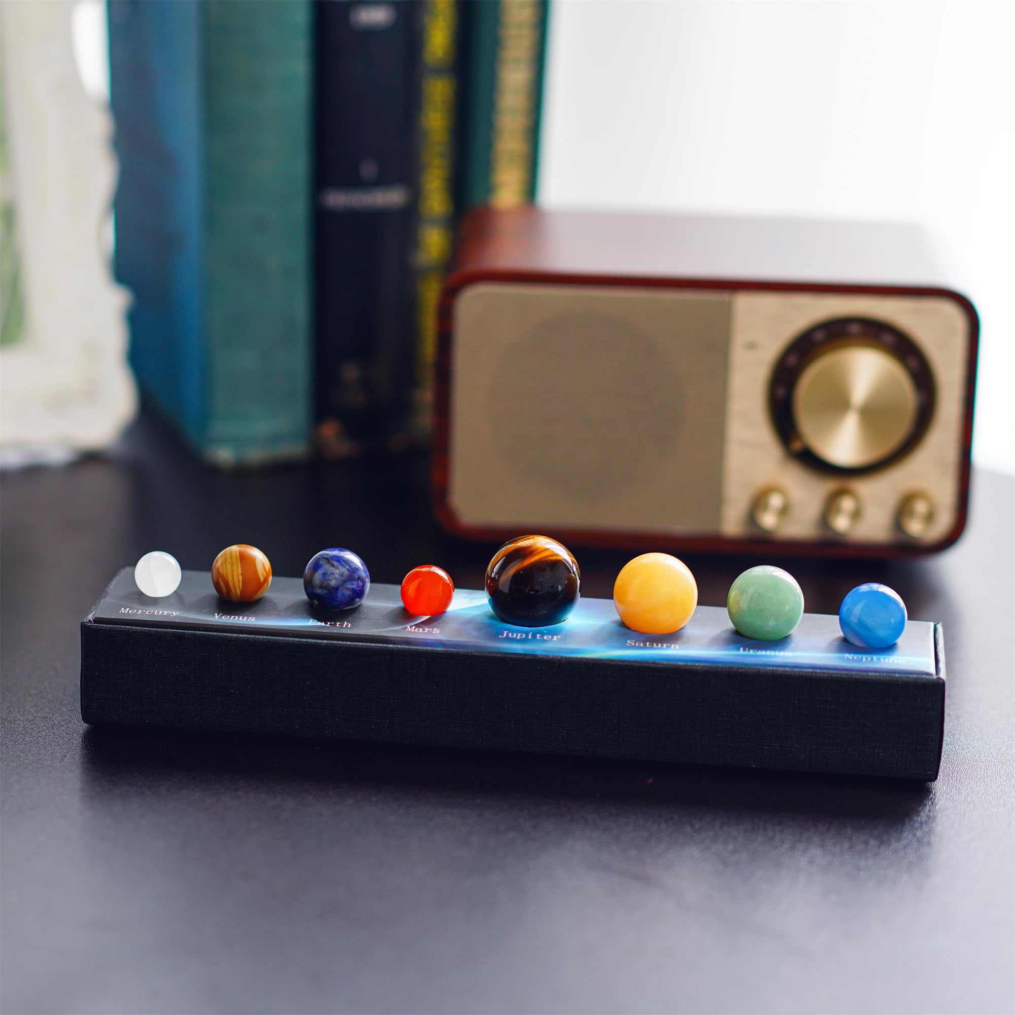 KRISININE Uranus ball supports space-themed meditation and study prompts.