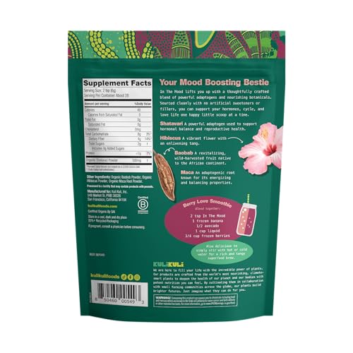 Kuli Kuli Mood Magic powder on a spoon, ready for smoothies