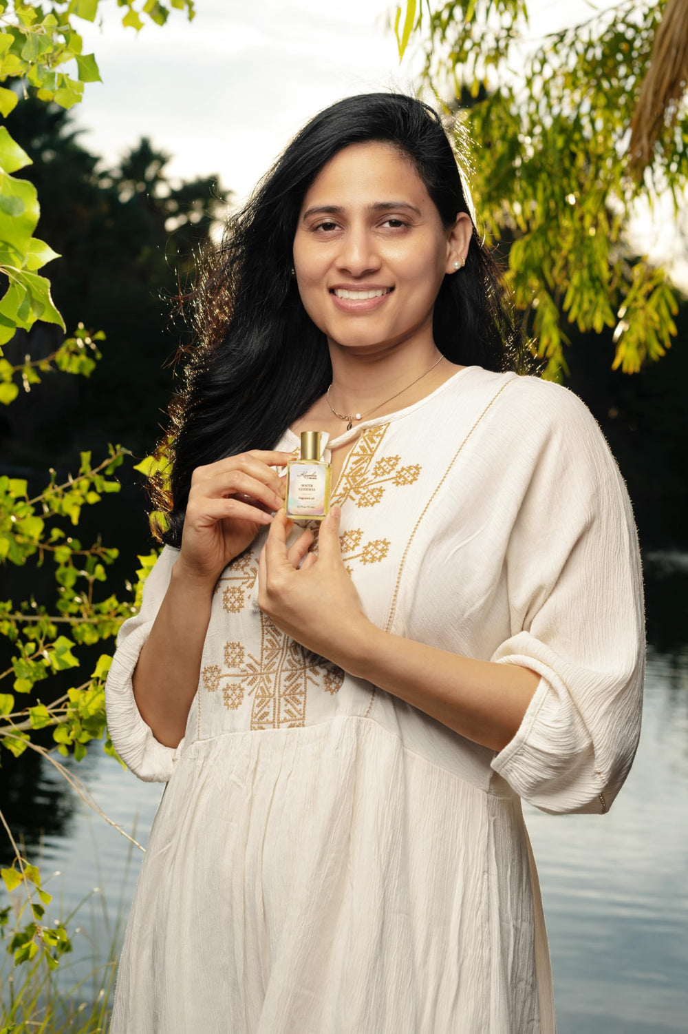 Kuumba Made Water Goddess roll-on application for quick, long-lasting aroma on skin