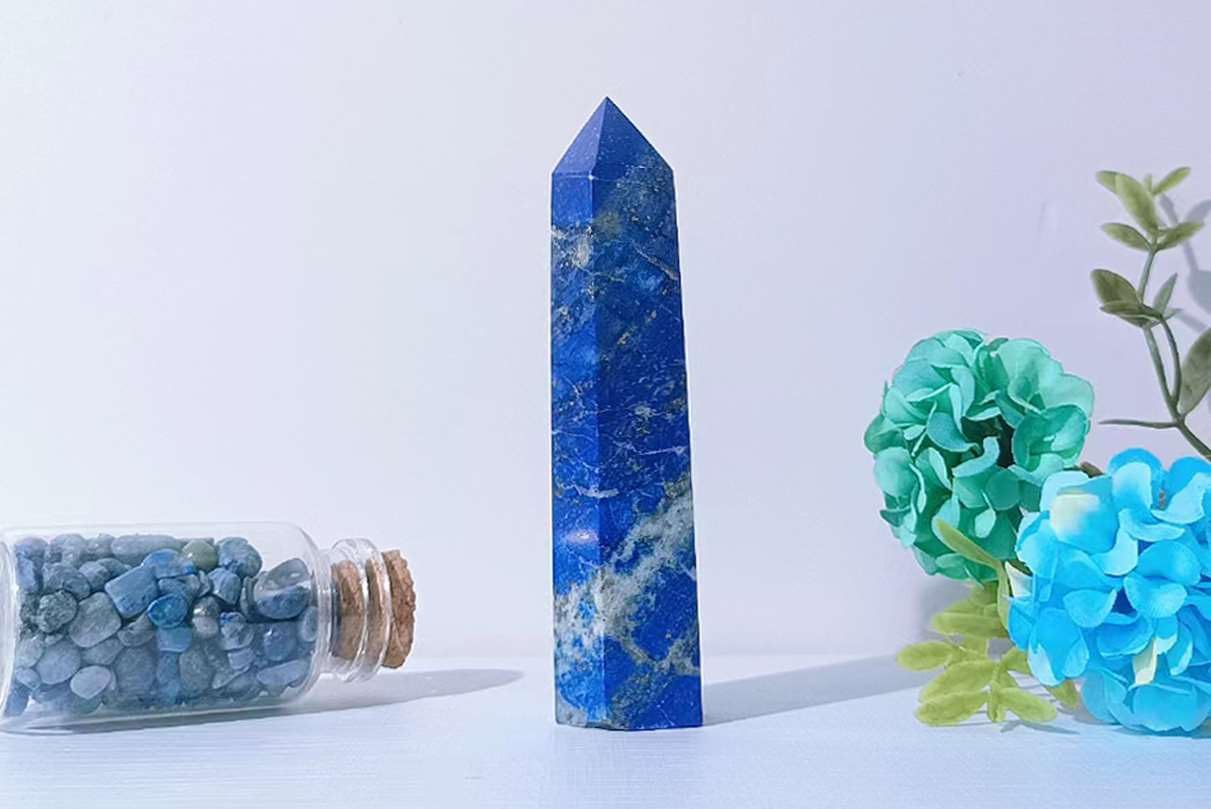 LAIDANLA Lapis Lazuli Wand – meditation tool on a serene surface
