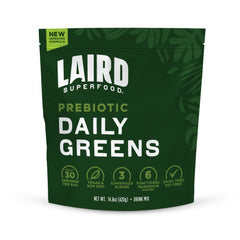 Laird Superfood Prebiotic Daily Greens powder pour promotes quick mixing for a nutritious start