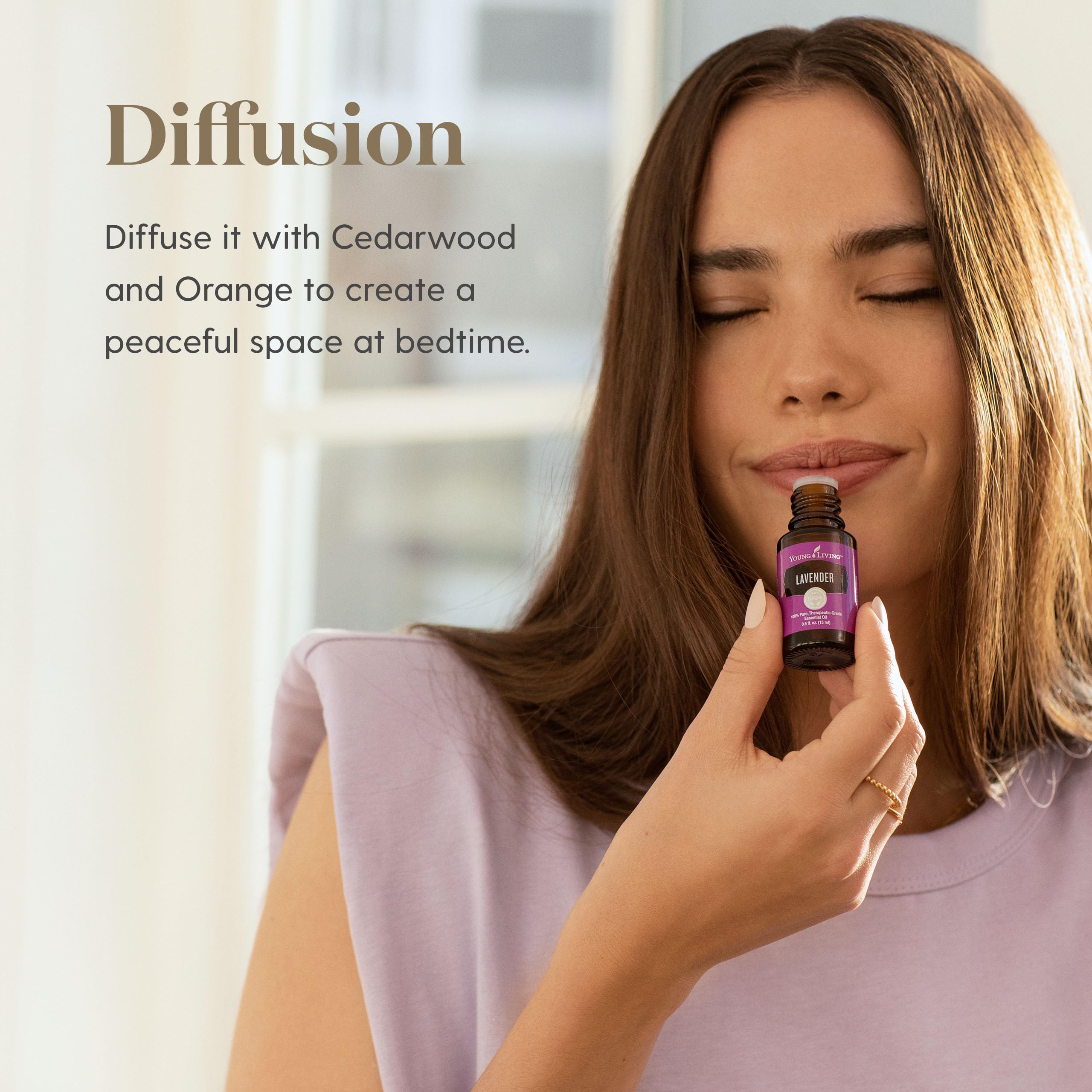 Lavender field with Young Living bottle evoking calming culinary aromas