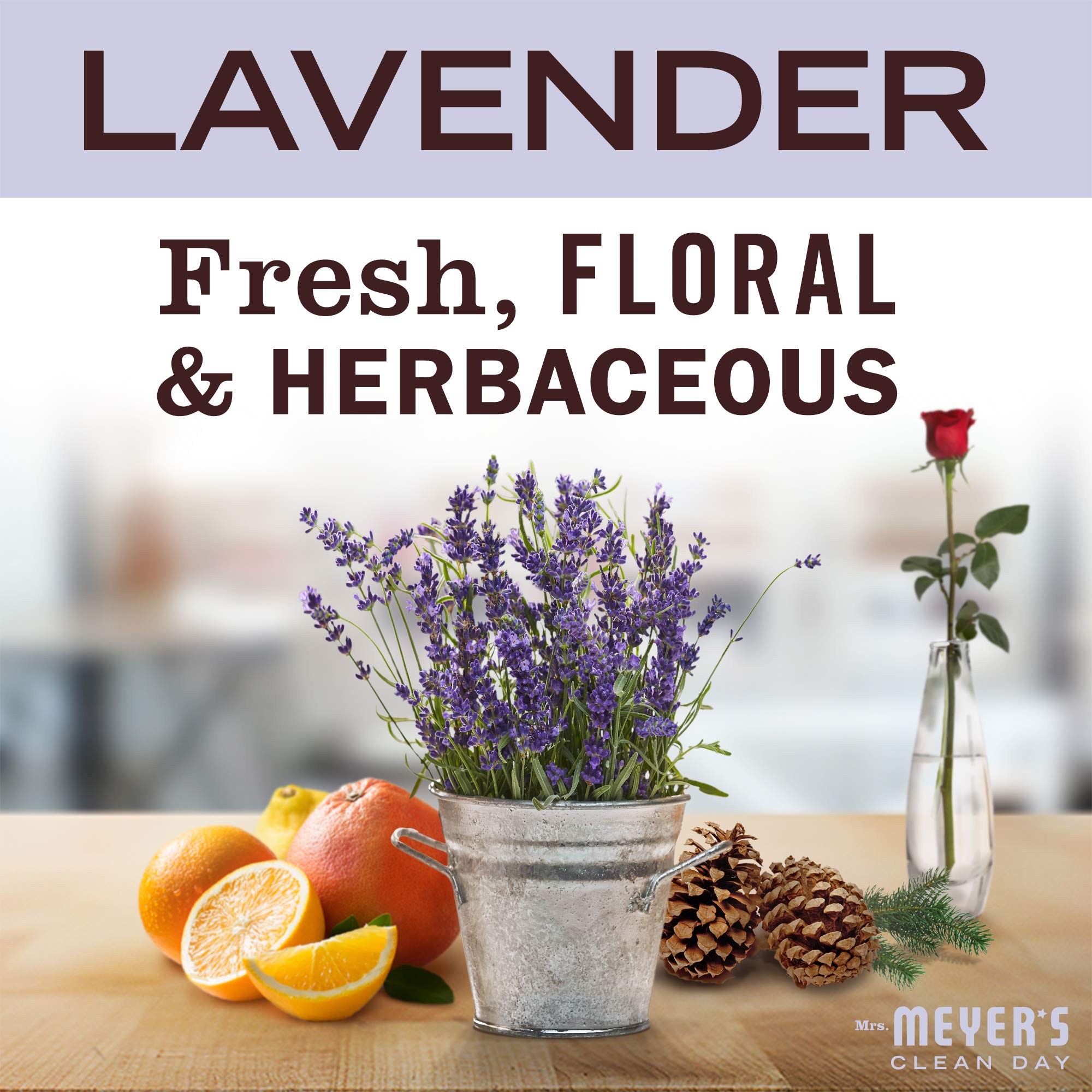 Lavender flowers beside hand sanitizer suggesting natural fragrance.