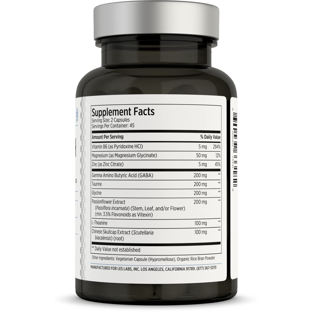 Close-up of LES Labs GABA Health capsules for relaxed focus.