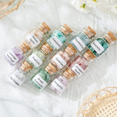Lezoroqota mini crystal bottles display: compact charms for altar setups.