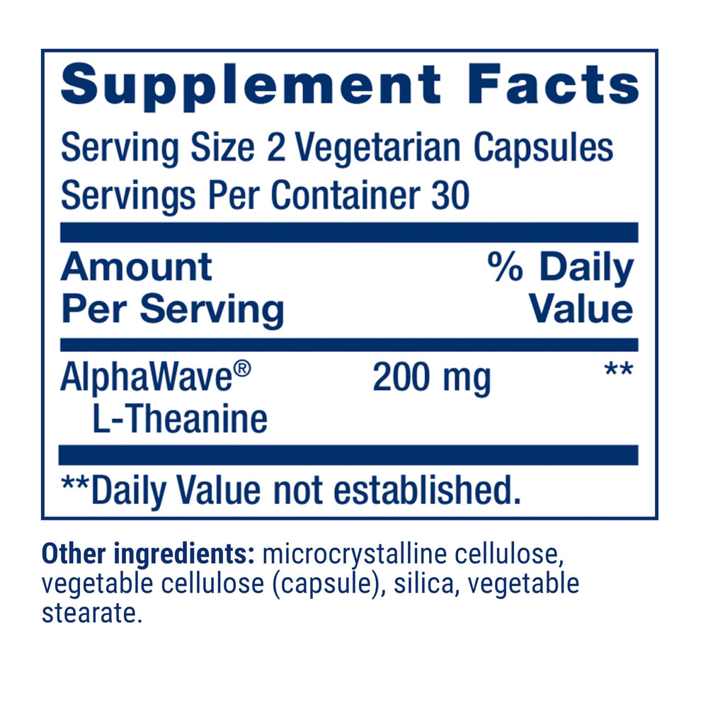 Close-up of Life Extension L-Theanine capsule showing pure dosage.