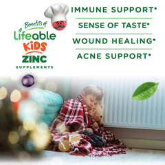 Lifeable Zinc Gummies for Kids hand holding berry-flavored gummies showing chewable texture.