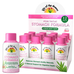 Lily Of The Desert stomach formula shot bottle pouring for on-the-go use.