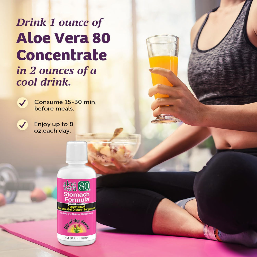 Glass with Lily of the Desert Stomach Formula mixed for a ready-to-drink option.