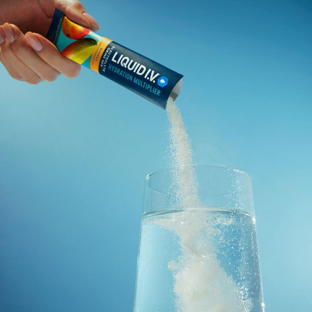 Liquid I.V. Hydration Multiplier Mango dissolving in water for flavorful hydration