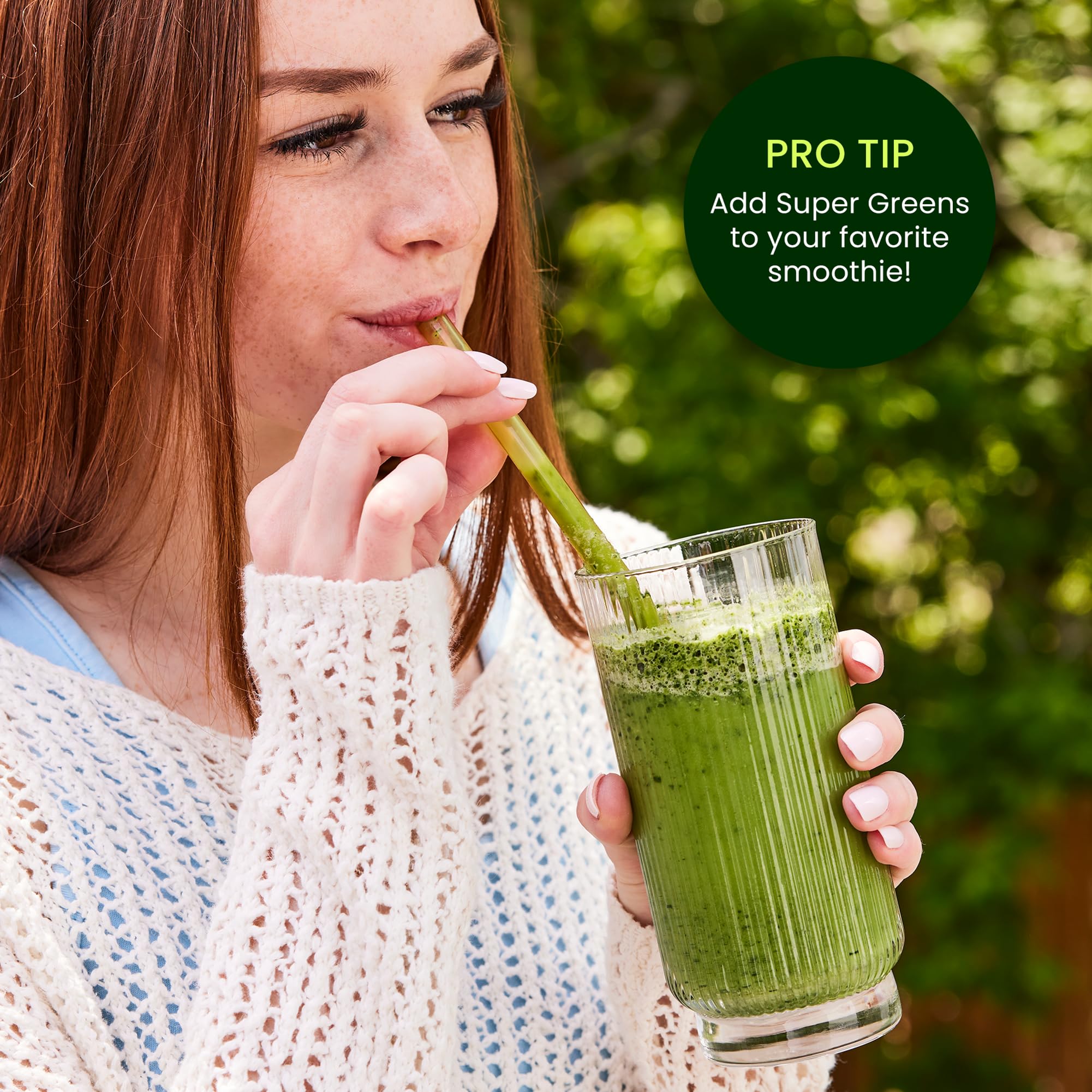 LIVE IT UP Super Greens powder jar sits beside probiotic label signaling gut-friendly formula.