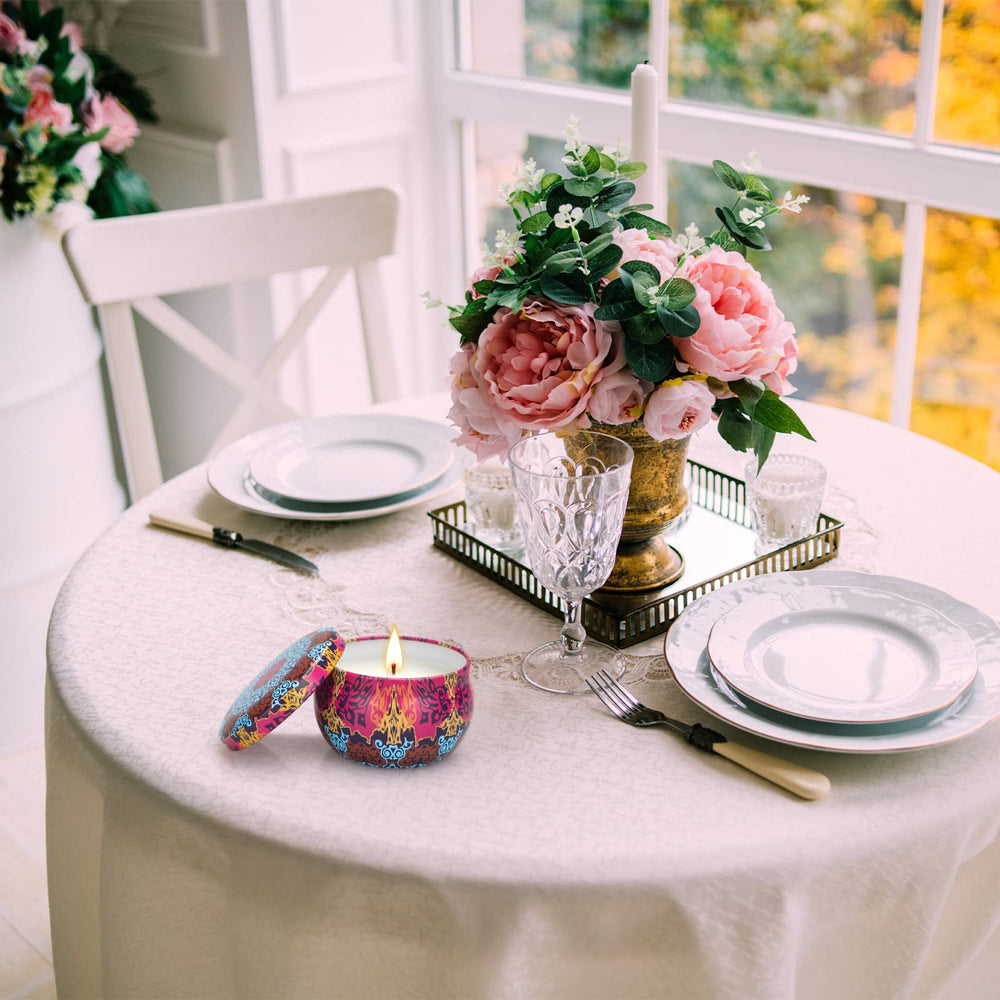 LKDJR Cranberry Clove candle jar with festive fragrance and warm glow.