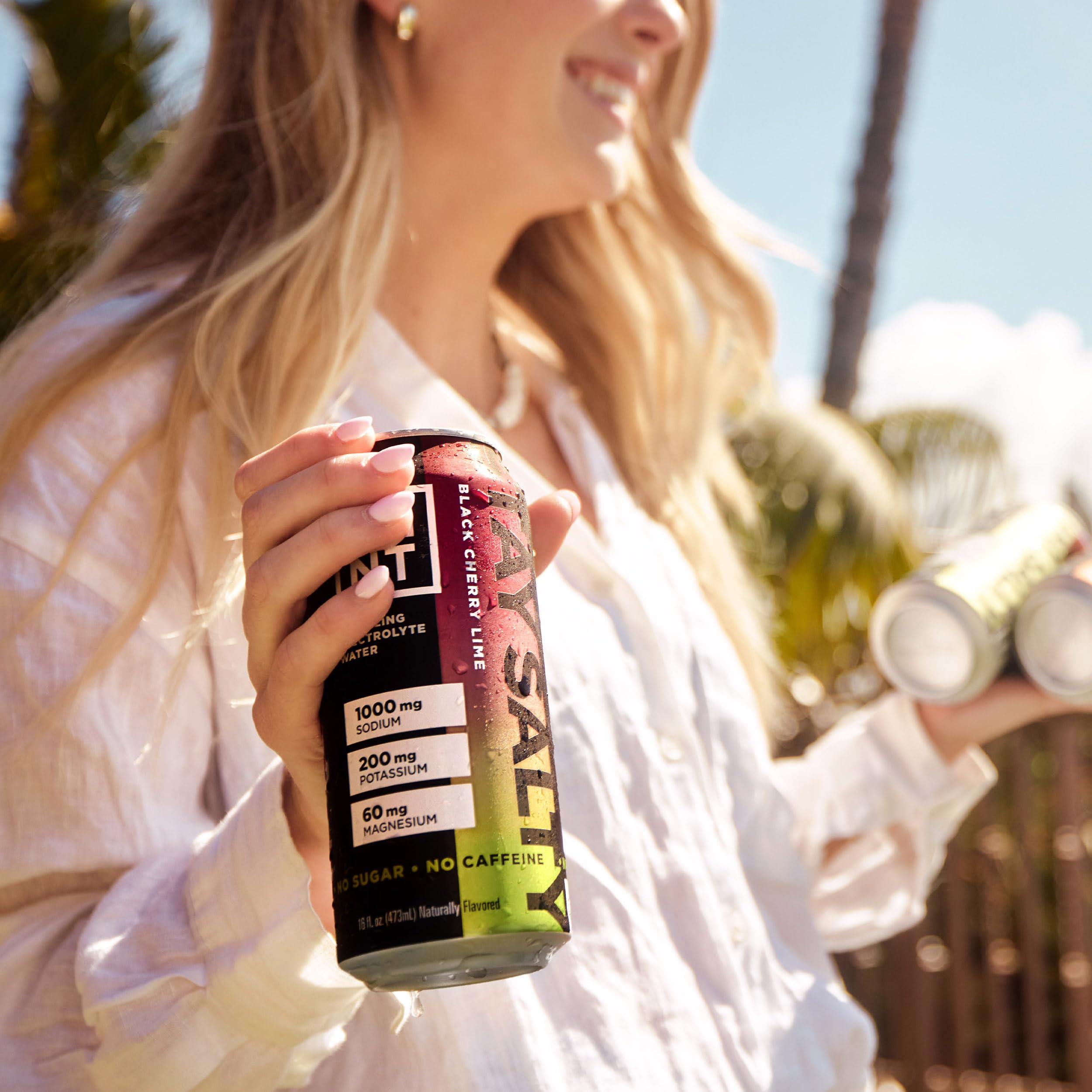 Straw in cold glass with LMNT Sparkling for a crisp, refreshing electrolyte drink.