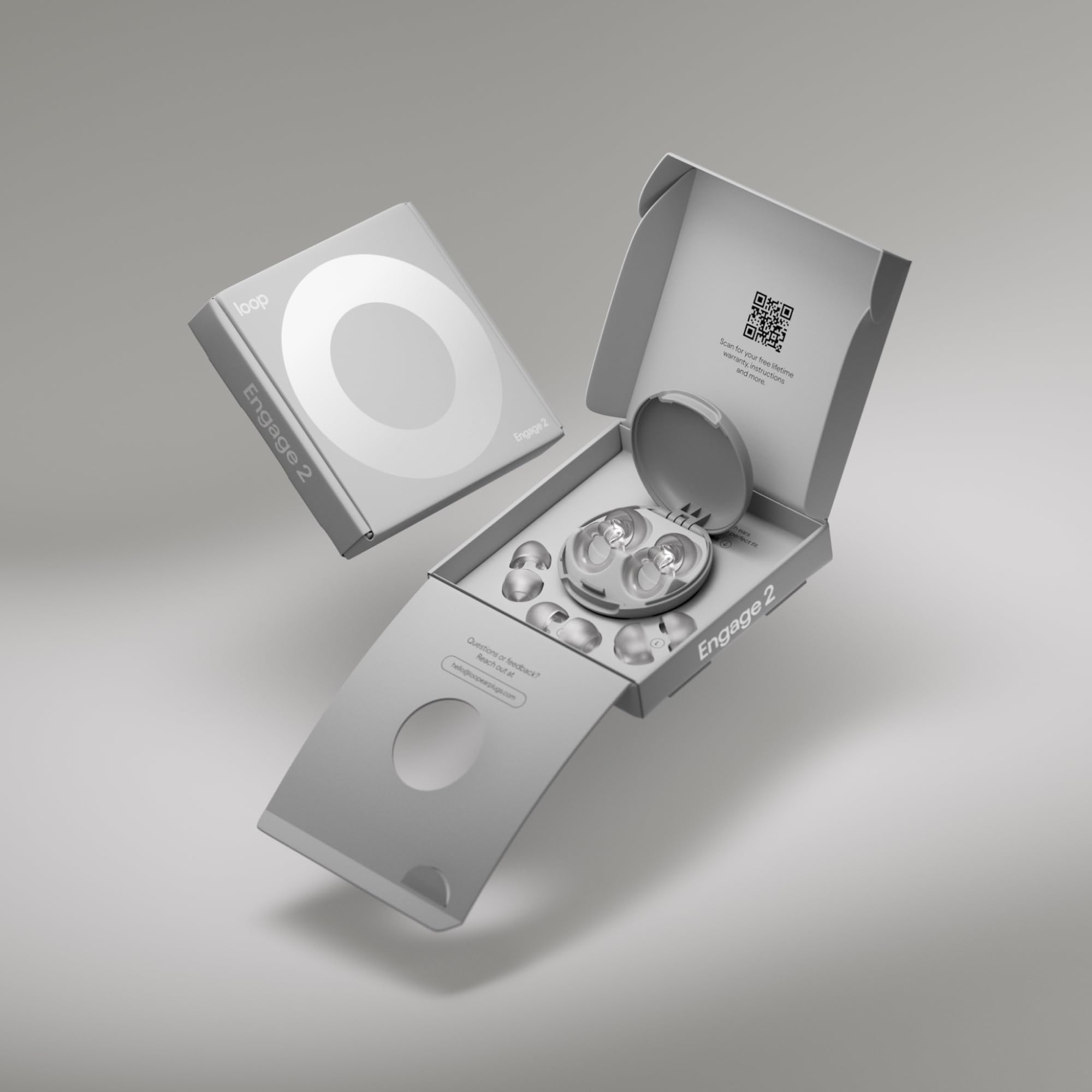 Loop Engage 2 earplugs in conversation during a social moment with clear speech.
