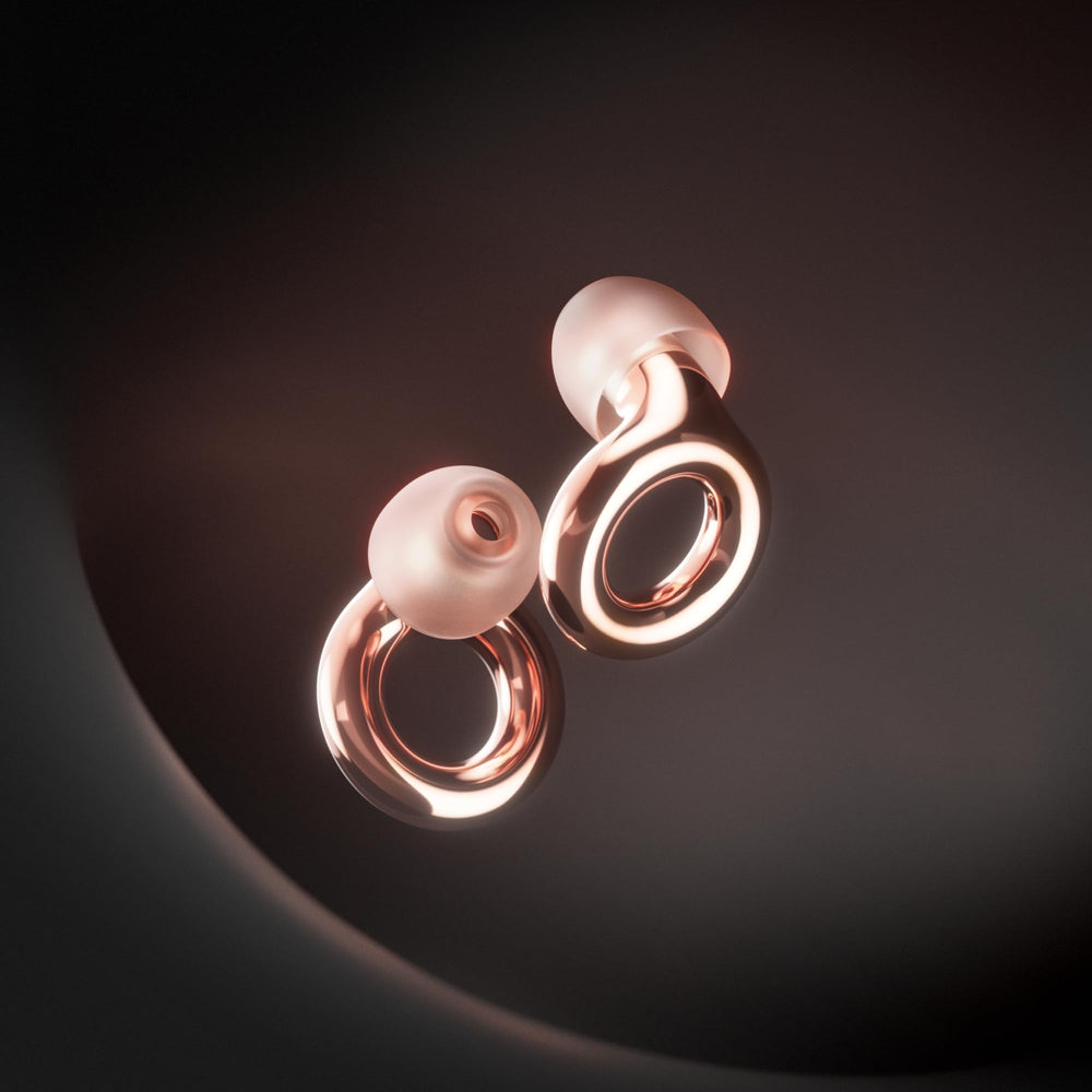 Loop Experience 2 earplugs worn at a concert to reduce volume while preserving clarity