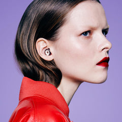 Loop Experience 2 Plus earplugs inserted in-ear for listening at events