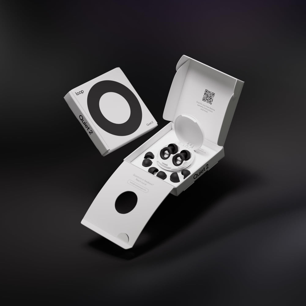 Loop Quiet 2 earplugs being inserted for a comfortable night’s sleep.