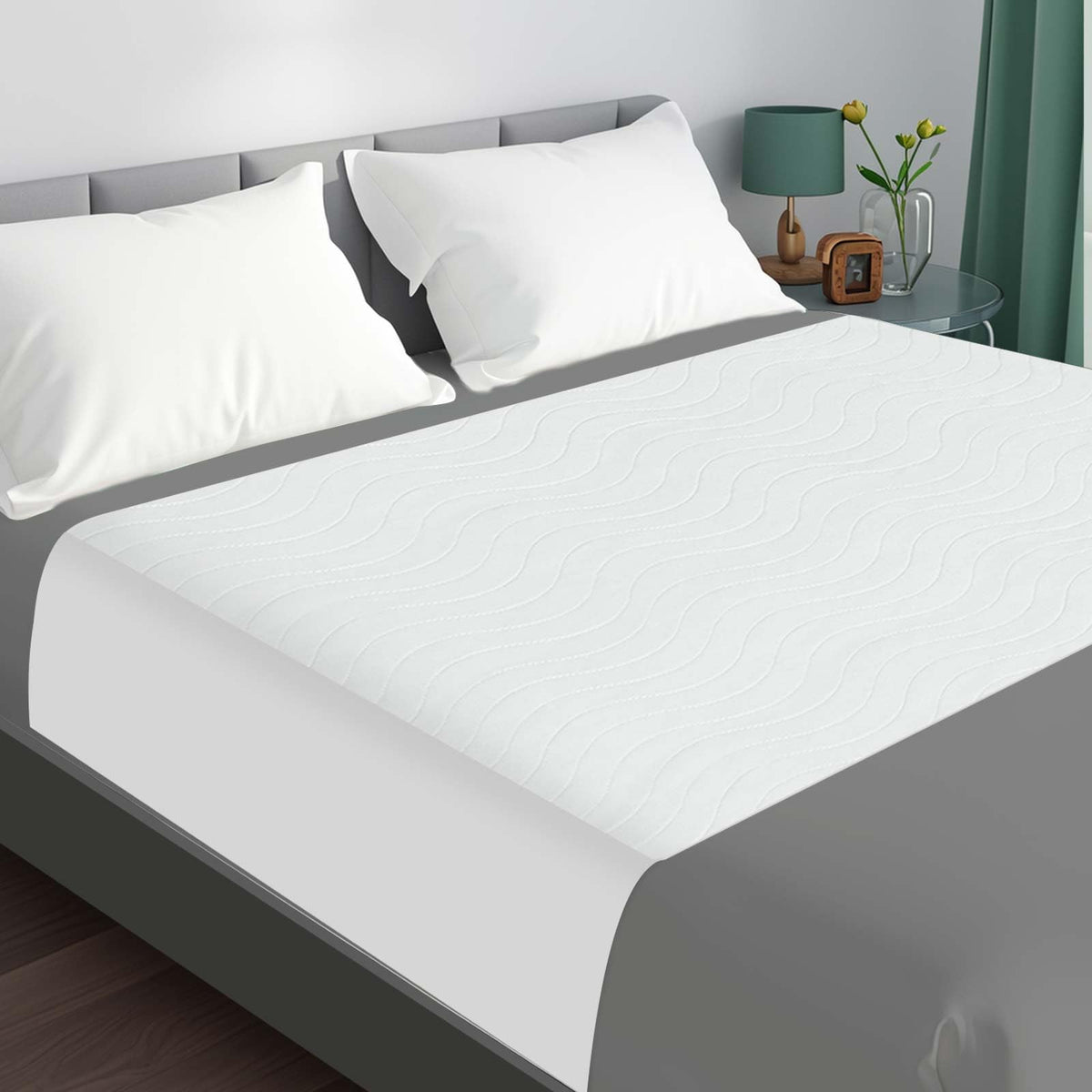 LotuFlor bed pad washable waterproof king 36x76 provides full mattress coverage and leak protection.
