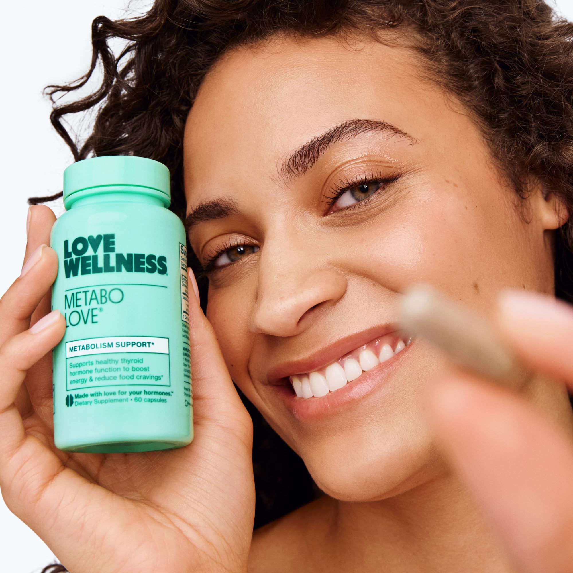 Love Wellness Metabolove in-use shot demonstrates easy daily dosage.