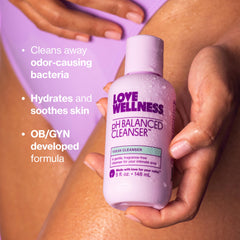 Rinsing moment with Love Wellness pH Balancing Cleanser in the shower