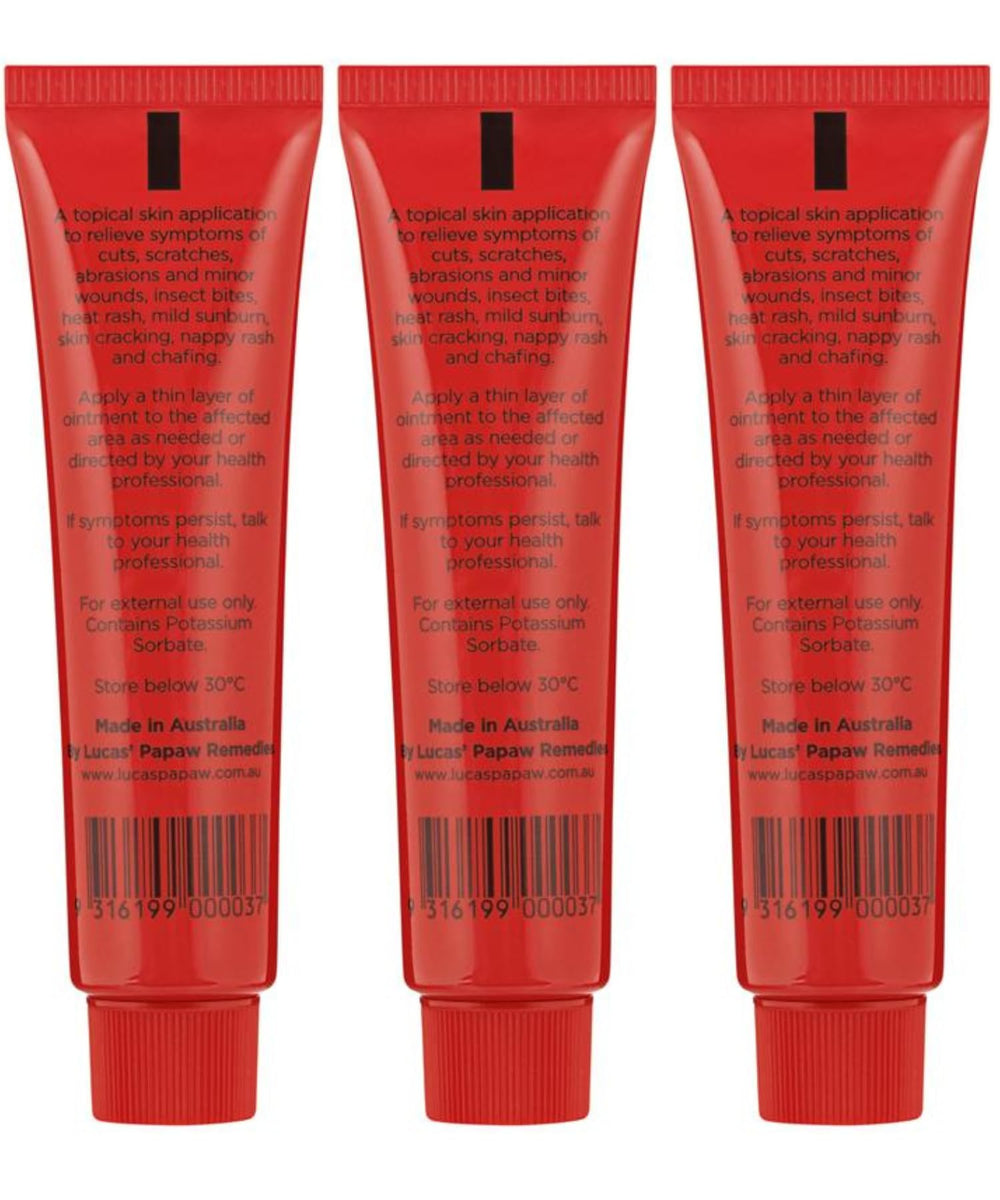Lucas Papaw Ointment lip applicator in use for precise lip care.