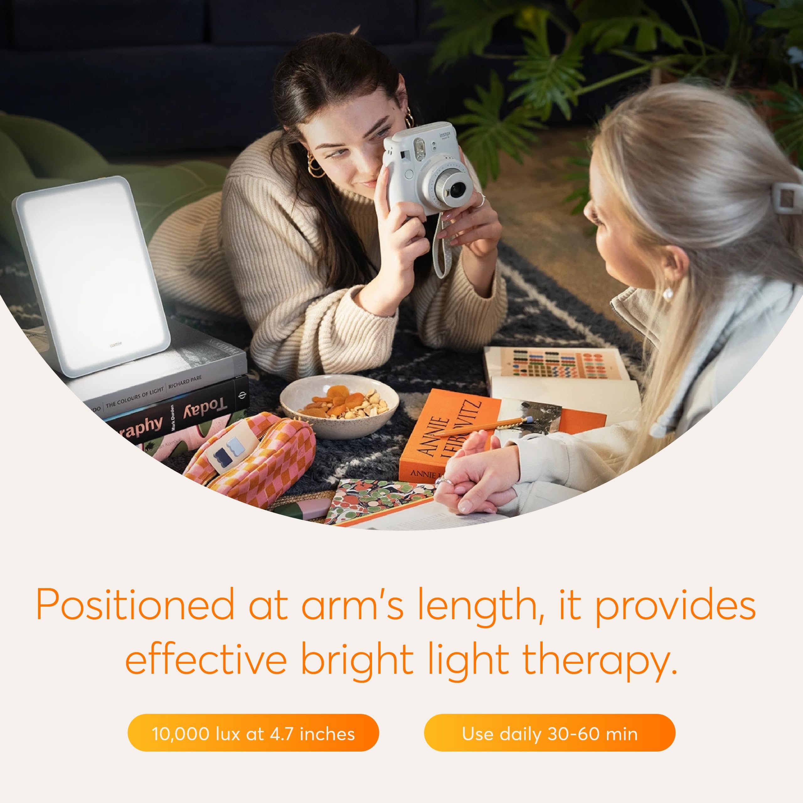 Lumie Mini Lamp on a campus dorm table signaling portability for college life