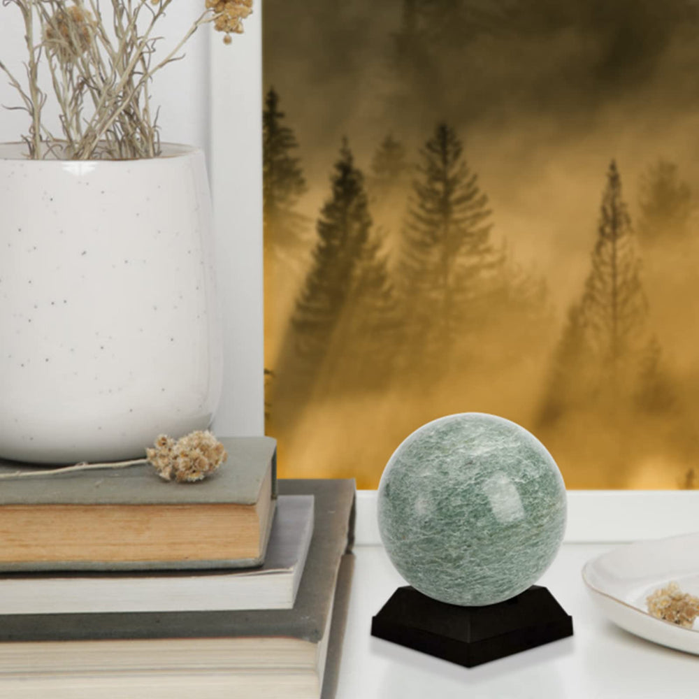Lyellfe jade Baoding balls displayed as an aquarium ornament