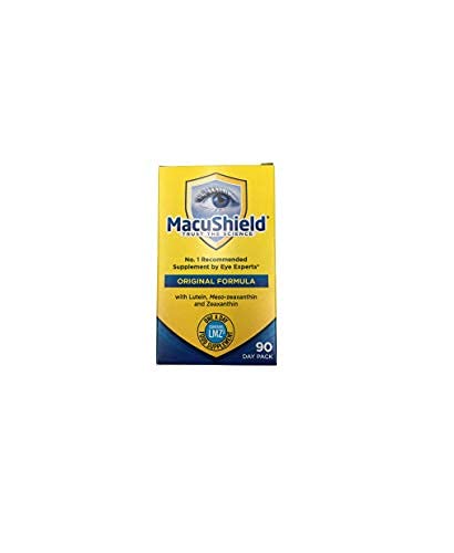 MacuShield capsules in hand suggesting daily supplement routine.
