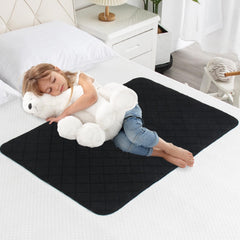 Magik & Kover waterproof bed protector pad on a surface