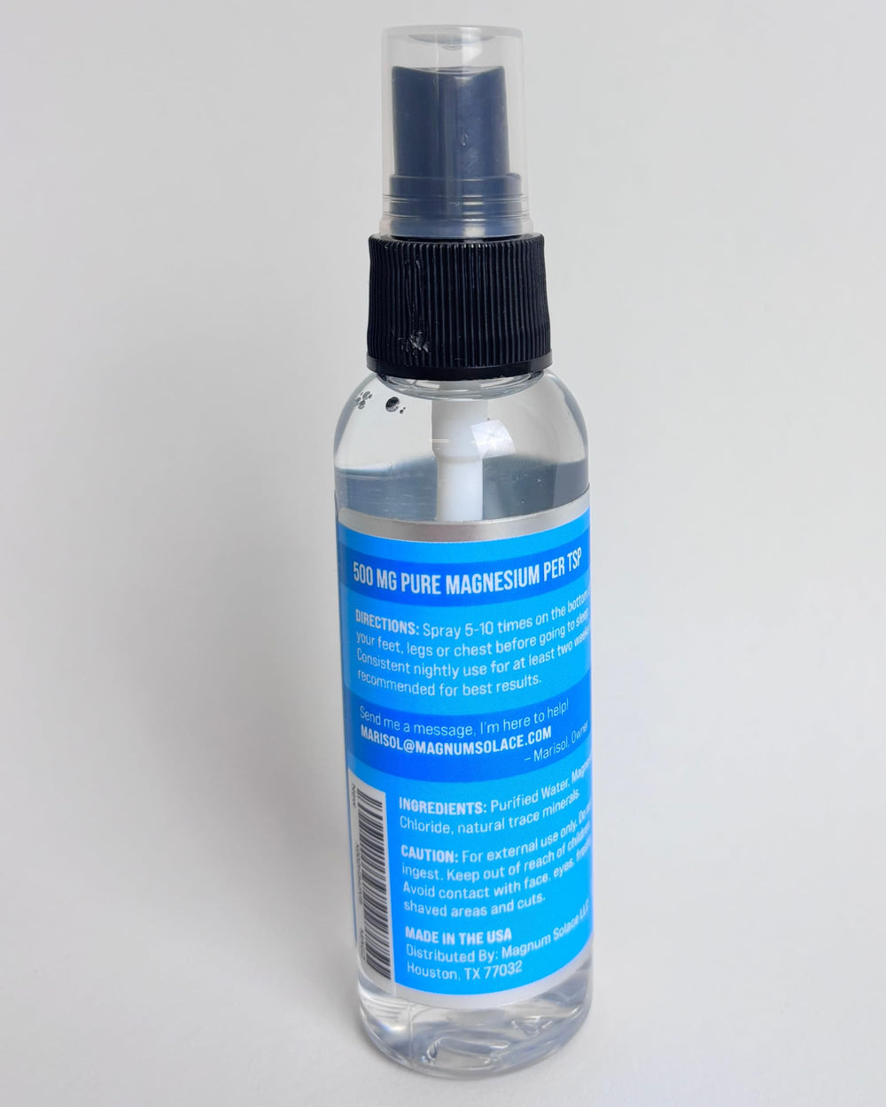Close-up of Magnum Solace bottle emphasizing quality and sea-derived minerals.