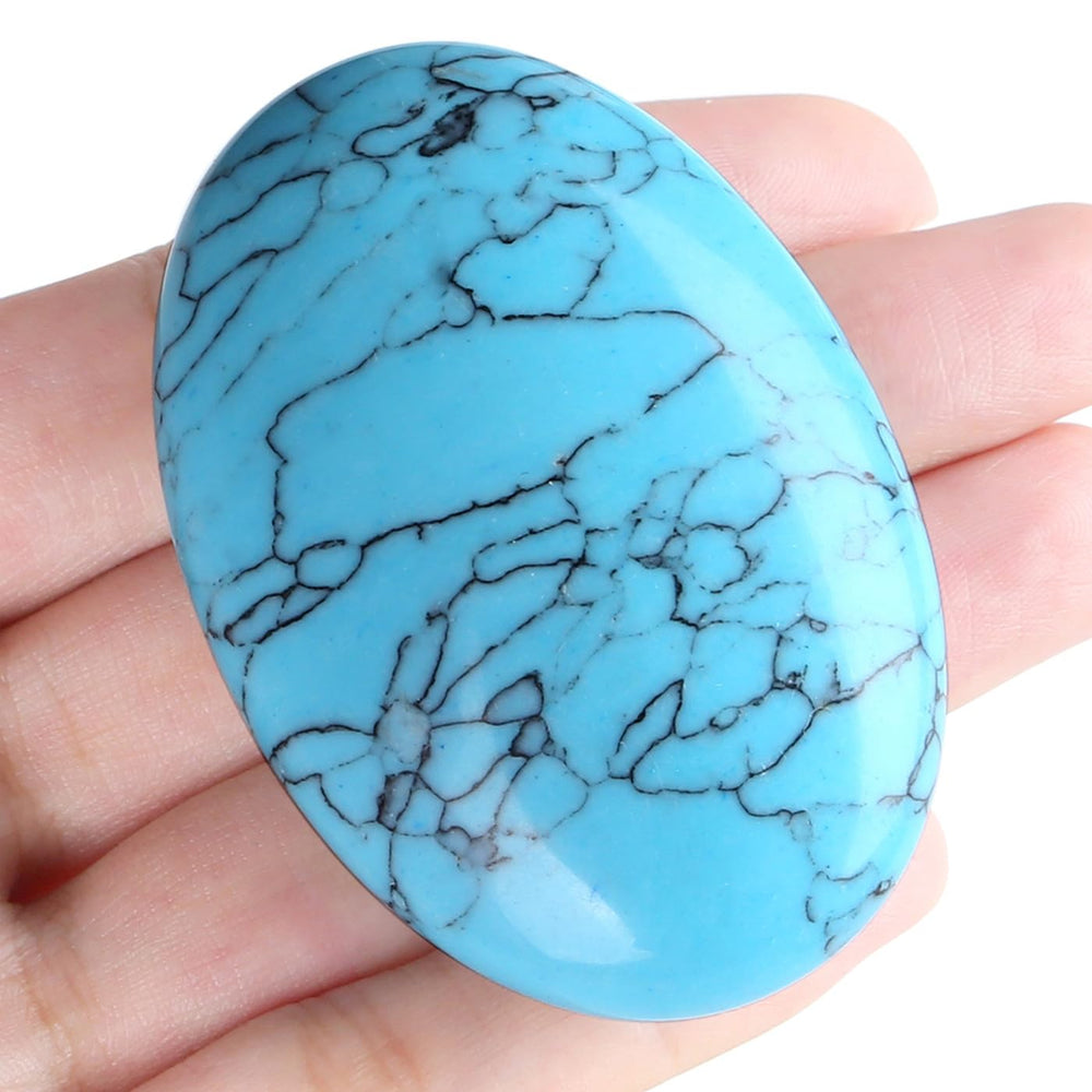 MAIBAOTA green turquoise palm stone in hand for grounding during focus sessions