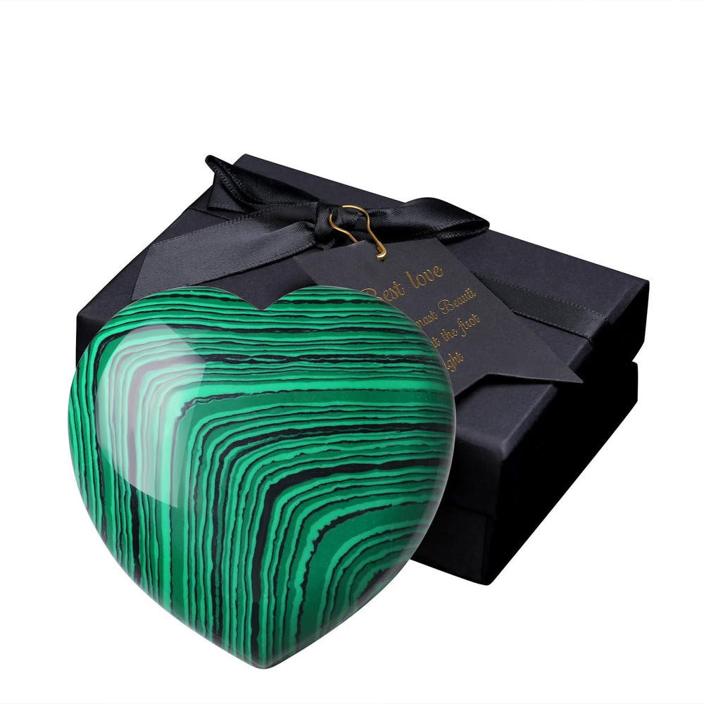 MAIBAOTA malachite heart in a living room setting enhances crystal decor.