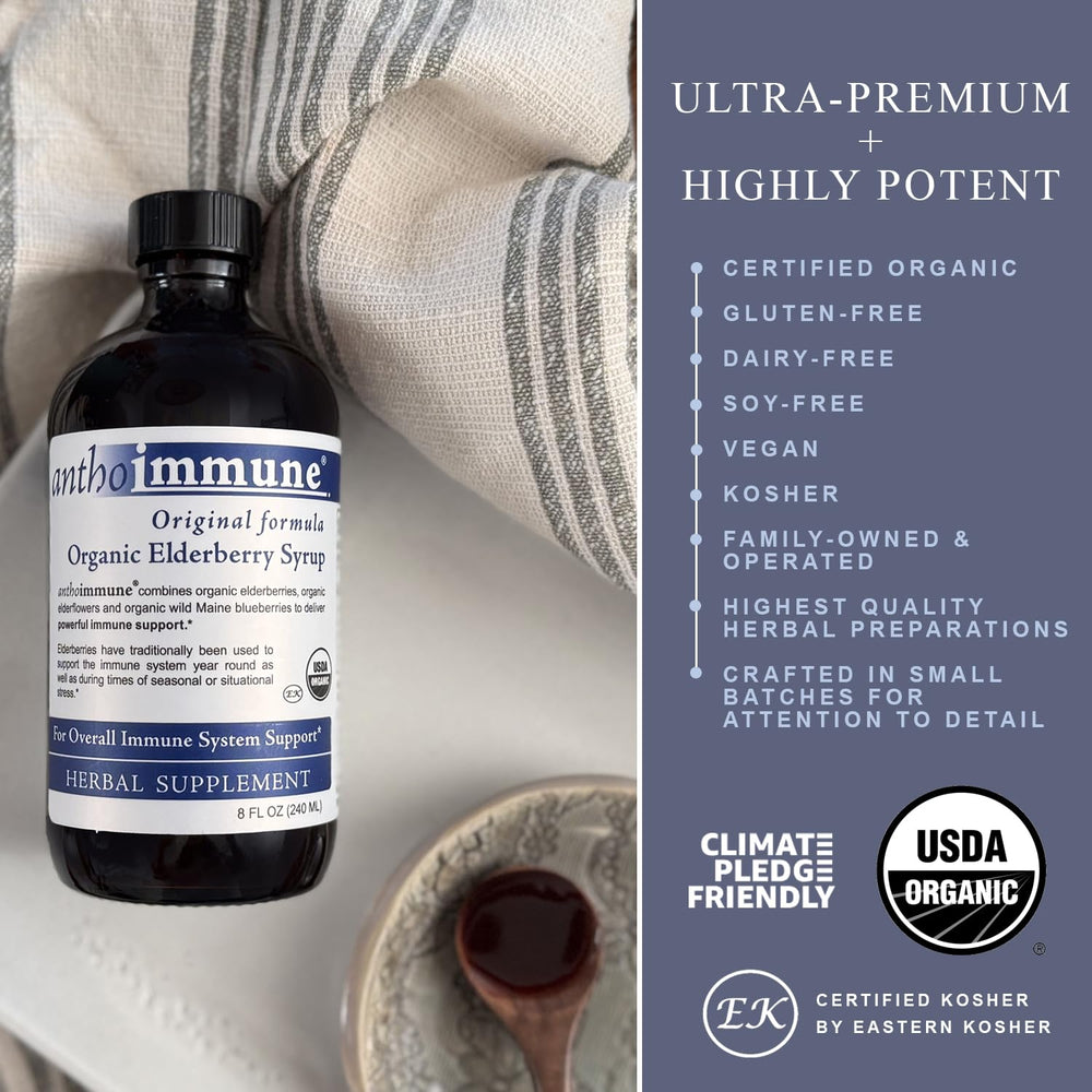 Pouring Maine Medicinals elderberry syrup into a glass