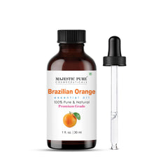 Majestic Pure Brazilian orange oil in amber bottle preserves freshness and protects from light