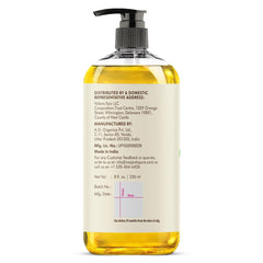 Majestic Pure coconut massage oil on palm ready for deep tissue sessions