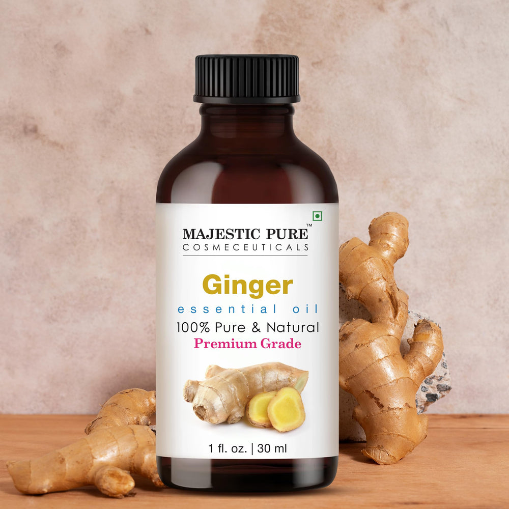 Majestic Pure Ginger Oil dropper stream controls dosage for diffuser blends.