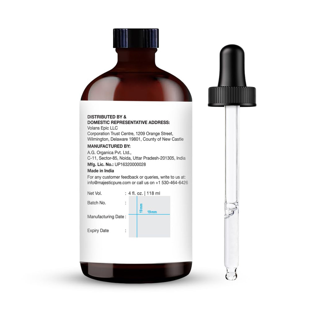 Majestic Pure grapefruit oil in amber bottle protecting from sunlight.