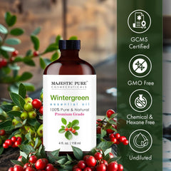 Close-up of Majestic Pure Wintergreen oil dropper, ready to measure.