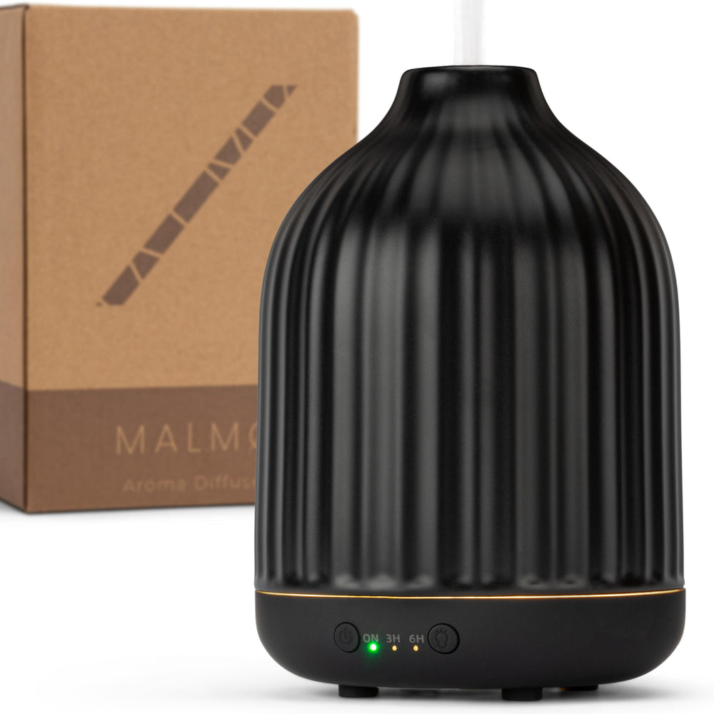 MALMØ Ceramic Diffuser front view showing 250ml tank and sleek design.