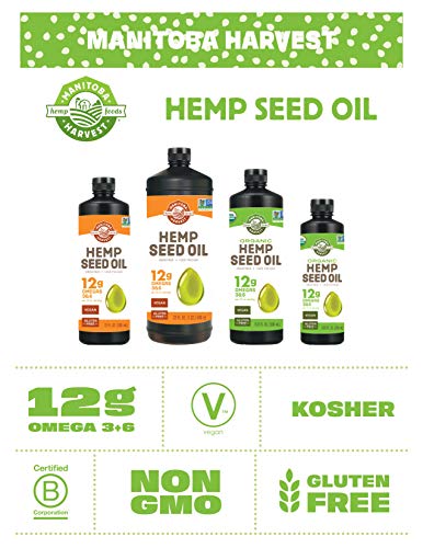 Manitoba Harvest hemp seed oil being poured over a fresh salad.