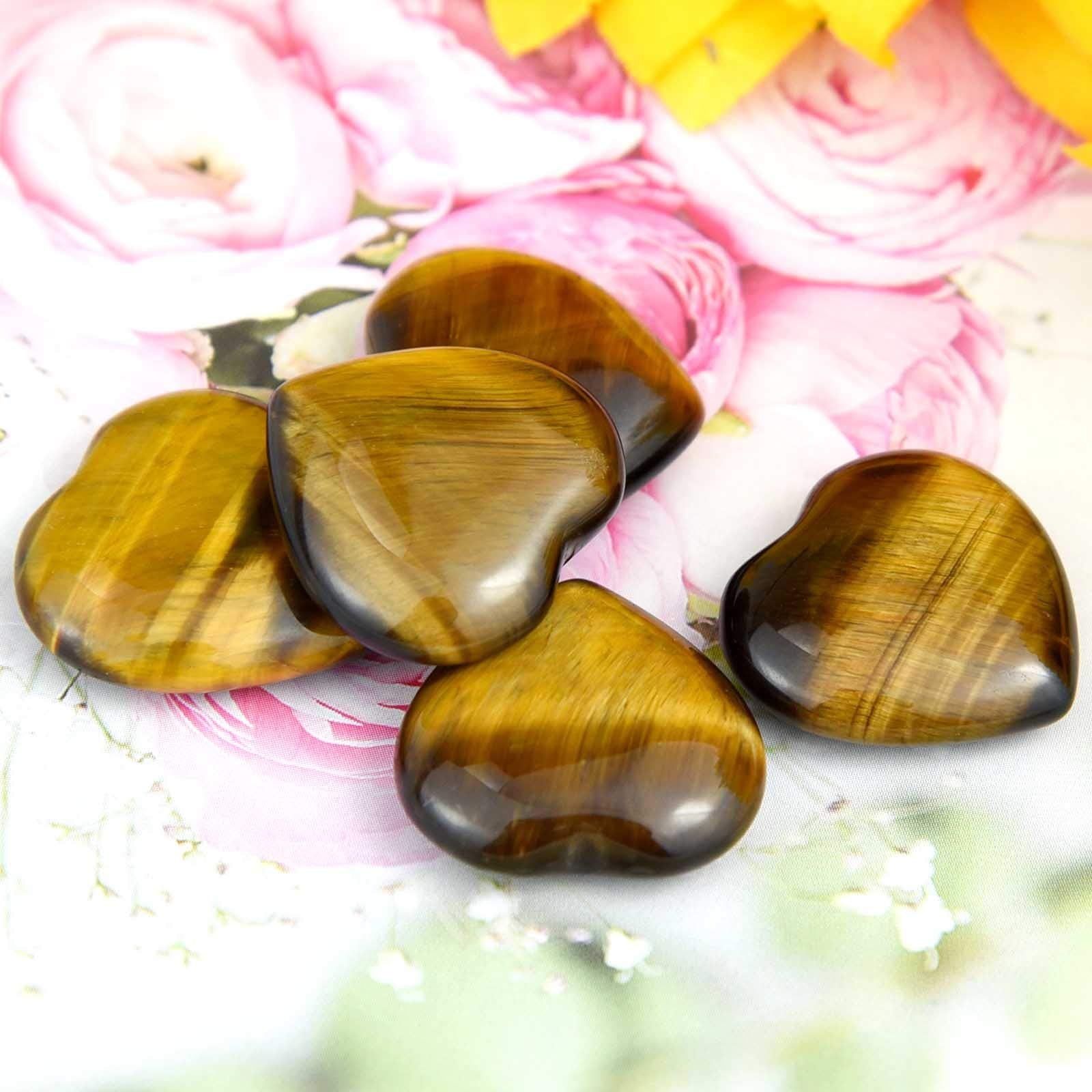 Marrywindix tiger eye heart stone during meditation for mindful concentration.