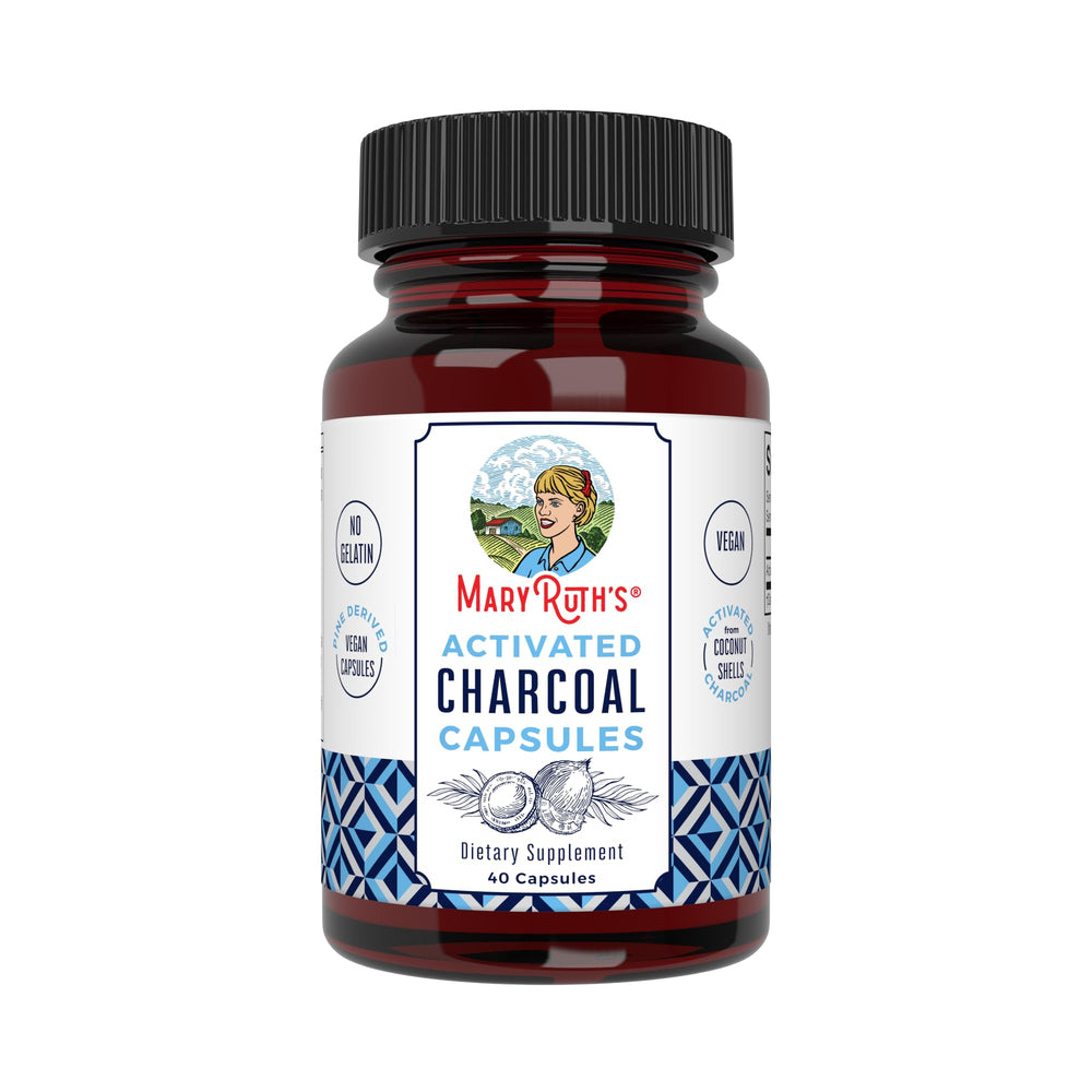 MaryRuth Organics activated charcoal capsules bottle close-up, vegan and non-GMO.