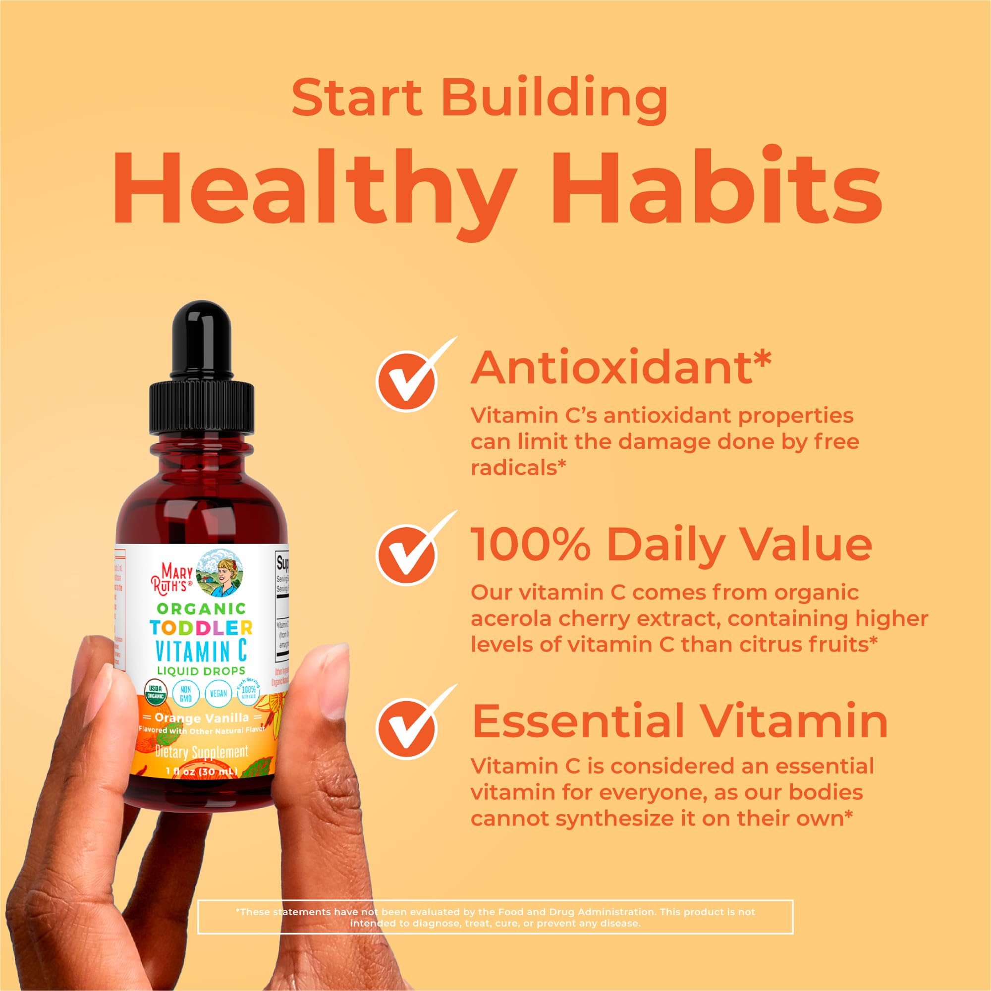 Droppers filled with orange liquid for MaryRuth Organics Toddler Vitamin C Drops dosing
