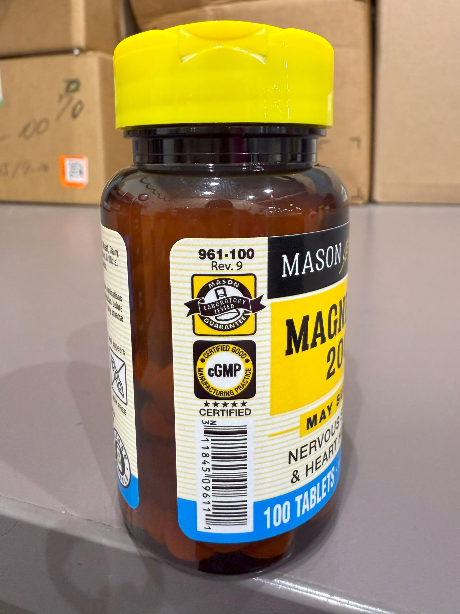 Mason Natural Magnesium 200 mg store display, convenient family supplement option.
