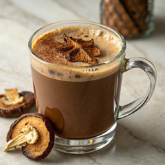 ShroomDNA steaming cup delivers rich Arabic coffee flavor.