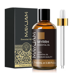 MAYJAM Myrrh oil bottle close-up showing amber glass and rich aroma