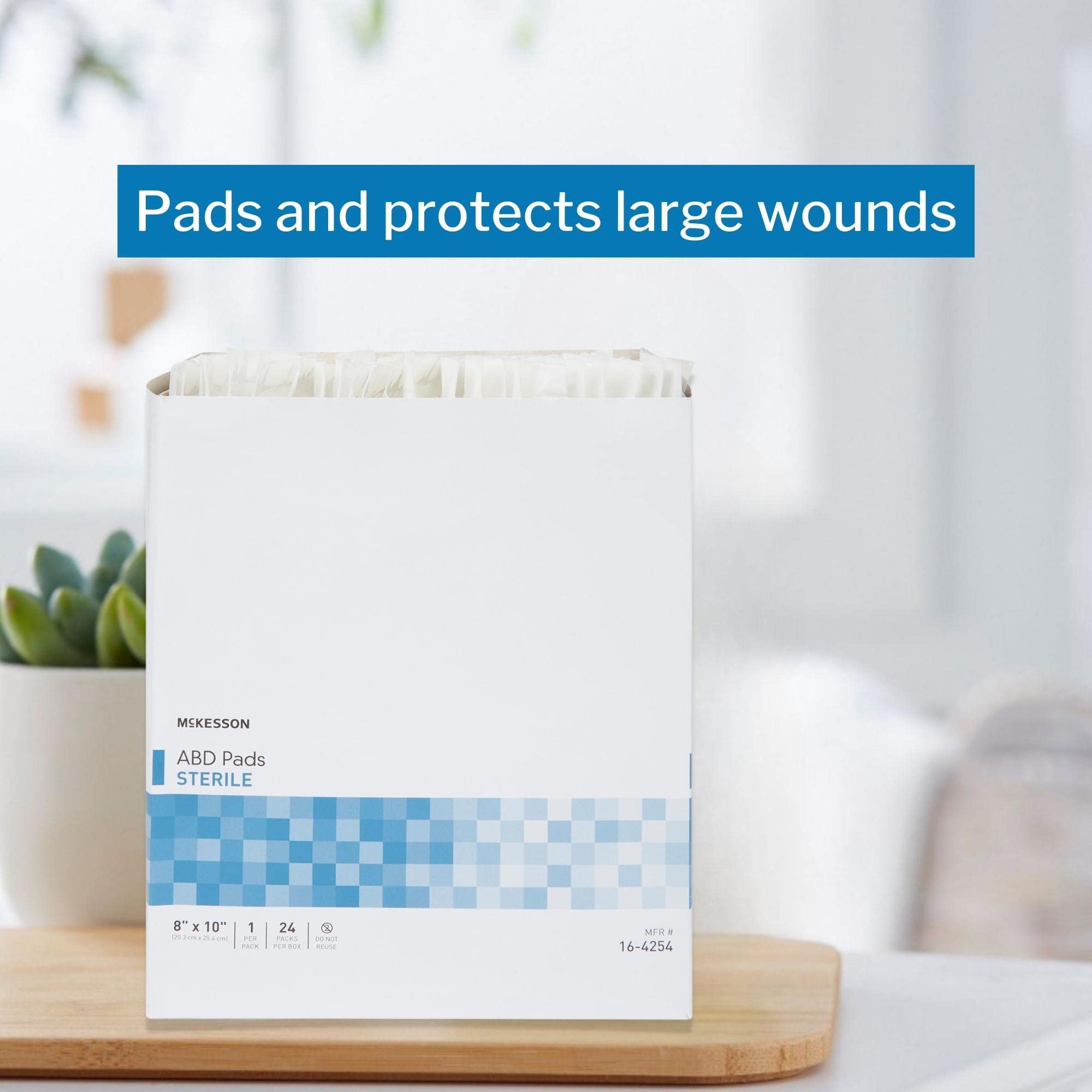 Clinical setting image highlights McKesson sterile abdominal pads in wound care routines.