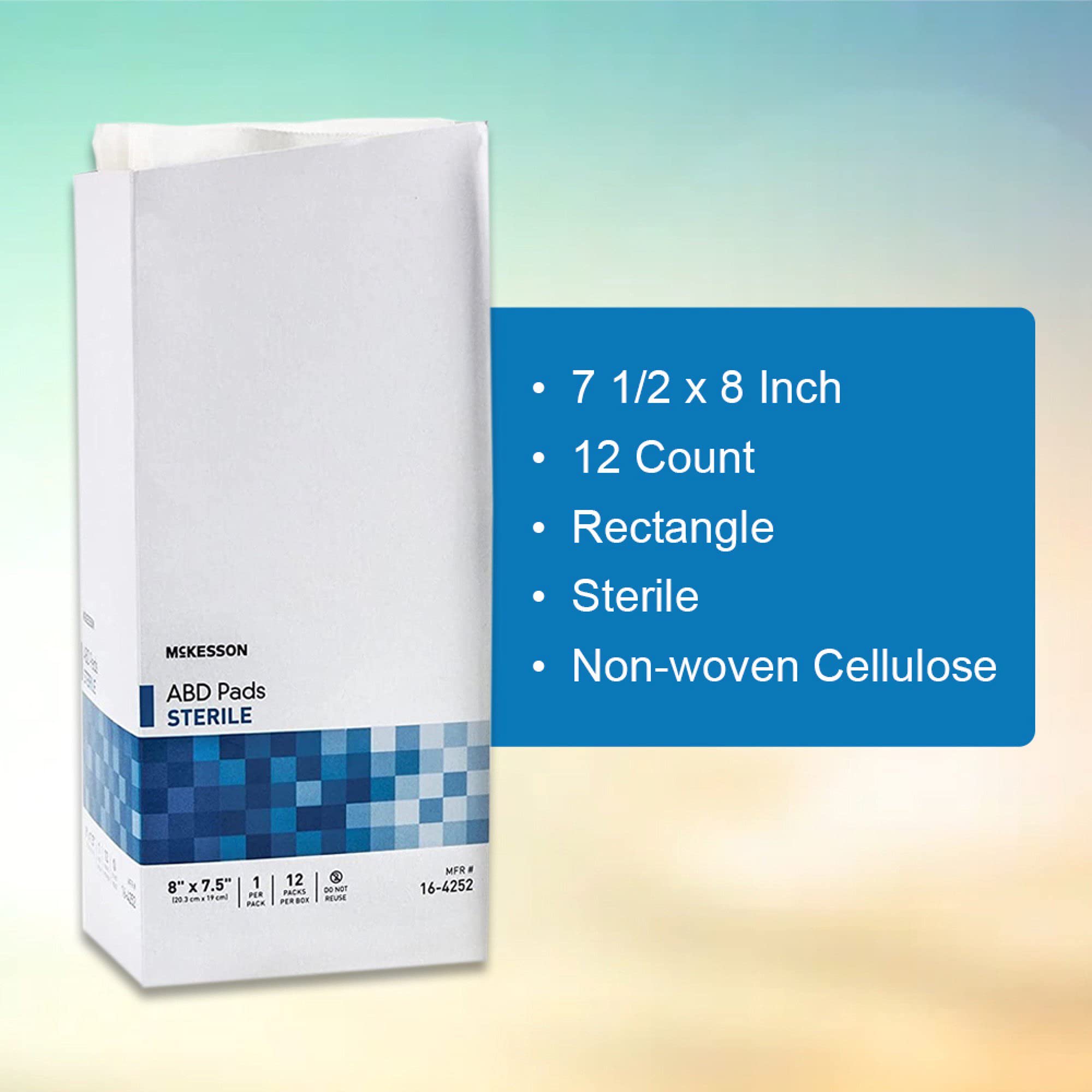 McKesson abdominal pads showing inner cellulose tissue for moisture management.