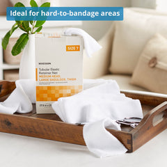McKesson tubular elastic retainer net dressing applied on head for hair-safe coverage