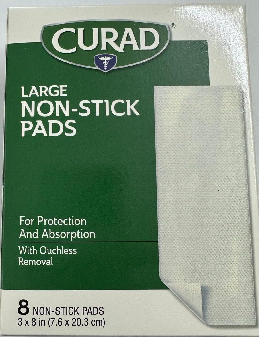 Medline Curad large non-stick pad laid over a wound for gentle removal.